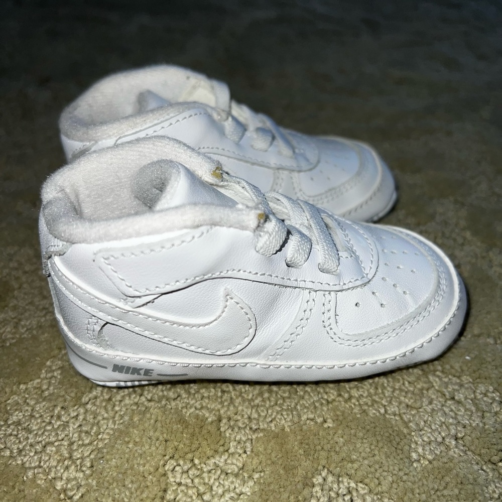 Baby Nikes size 4